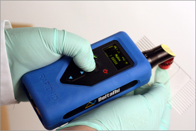 Figure 1: The Rapid-ID palm-sized material identification system in use.
