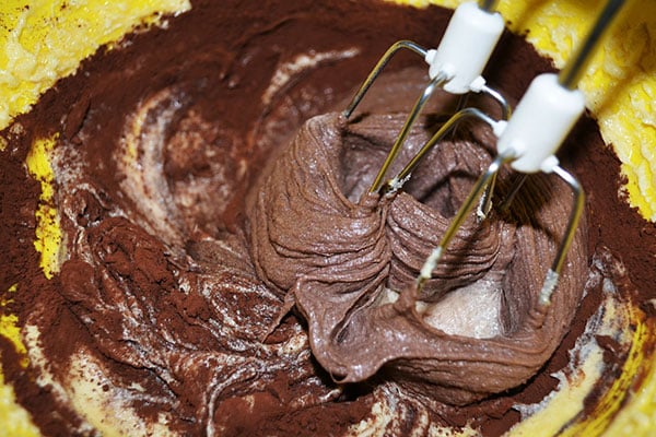 Cake batter with electric mixer - learn about the different types of magnesium and their applications in food formulations in the Prospector Knowledge Center.