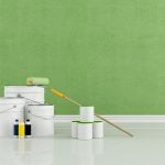 Green painted room with paint buckets - Learn more about Plant-based Additives for Greener Waterborne Coatings
