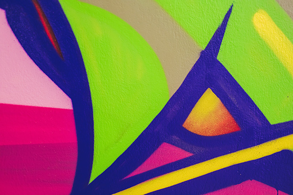 Bright graffiti on a wall - Learn more about The CIELAB L*a*b* System – the Method to Quantify Colors of Coatings