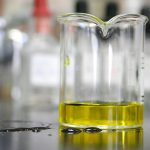 Beaker with amber liquid - Fundamentals of Polyester Resins