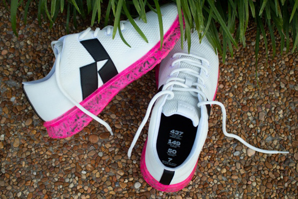 Avrio offers a range of footwear in diverse colors, including this white pair with magenta soles. 