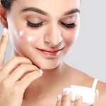 Person using facial cream